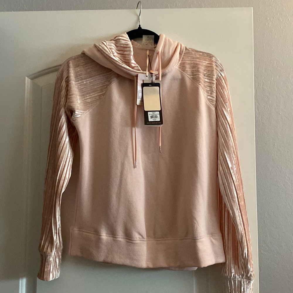Calia by Carrie Underwood light pink.
